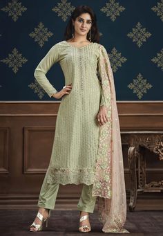 Pista green chinon pakistani suit ACU9253  Desc:  Style : Pant Style Suits Color : Pista Green Fabric : Chinon Work : Embroidery   Sequence Wash Care : Dry clean Sleeve Style : Full Sleeve Long Sleeves : Done only in Custom Stitch Sleeves Lining : Done only in Custom Stitch Bust Size : 32 to 42 Inches Occasion : Temple Wear   Social Gathering   Lohri   Raksha Bandhan   Vaisakhi. With Express Free Shipping and Custom Stitching, Buy Indian Party wedding wear bridal Anarkali Salwar Pista green chin Pakistani Suit With Pants, Latest Pakistani Suits, Bridal Anarkali, Pista Green, Pakistani Suit, Pakistani Salwar Kameez, Wedding Saree Indian, Embroidery Top, Pakistani Suits