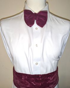 "Beautiful luxurious silk velvet cummerbund in a wine/cranberry red. Lined with matching colour silk taffeta. Smooth without pleats. In an elegant slightly \"Crushed\" velvet. This was a custom bespoke item hand tailored. Velcro closing is adjustable. If needed, I can tailor it to make it smaller but if this is what you would like please ensure your etsy account email is up to date so that you will see my messages. Measurements are: to fit comfortably from 34 up to 40 inches wide waist, and height at the widest point is 4.25 inches / 11cm. Matching colour bow ties in the shop. Also lots of black bow ties, see the black bow tie section in the shop menu." Purple Bow Tie For Party, Purple Party Bow Tie, Fitted Red Bow Tie For Wedding, My Messages, Silk Gifts, Black Bow Tie, Vintage Cufflinks, Silk Taffeta, Wide Waist