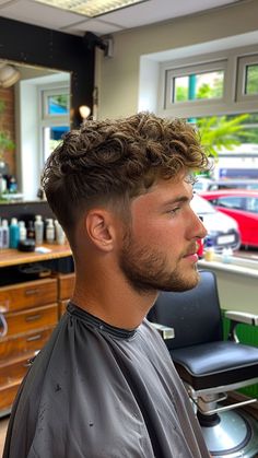 25 Skin Fade Haircuts That Modernize Your Style Half Fade Haircut Men, Men's Wavy Haircut, Men’s Curly Fade Haircut, Low Fade Curly Haircut, Curly On Top Short On Sides Men, Haircut With Lines Mens, Hair Styles For Men Curly Hair, Clipper Haircuts Men, Faded Curly Hair Men