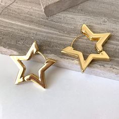 New~ Anthropologie Gold Star Huggie Hoop Earrings In The Shape Of A Star, These Sleek And Simple Earrings Are Great For Everyday! The Huggie Style Hinged Latch Makes Them Easy To Wear. These Would Be A Great Gift! Approx. 1"L, 1"W. Gold-Plated. Nwot. Star Huggie Earrings, Anthro, Preppy Style, Boho Style, Retro, 80s, 90s, Trendy, Brand New Anthropologie Jewelry, Everyday Hoop Earrings, Gold Hoops, Modern, Metallic, Shiny, Holiday, Usa, 4th Of July, Vacation, Patriotic, Shooting Star, Celestial Cute Everyday Earrings, Star Gold Jewelry, Gold Star Hoop Earrings, Gold Star Jewelry, Star Celestial, Earrings Gold Hoops, Jewelry Everyday, Star Hoop Earrings, Enchanted Jewelry