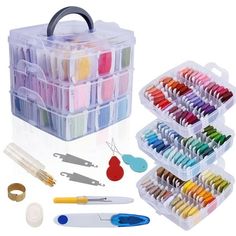 an assortment of crafting supplies including scissors, yarn and other items in plastic containers