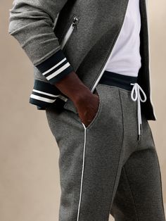 Athletic with a twist, this scuba-knit track pant is made from a sumptuously soft cotton blend with notable houndstooth — the perfect fusion of old-school style and modern athleisure.  TAPERED FIT: Mid rise.  Relaxed fit with a tapered leg.  Flat k Modern Athleisure, Scuba Knit, School Style, Track Pant, School Fashion, Track Pants, Athleisure, Old School, Banana Republic