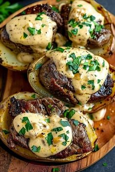 steak stuffed potatoes on a wooden platter