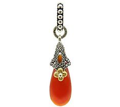 Update your neckline with this unique pendant from Barbara Bixby. A large carnelian cabochon radiates color from beneath a beautiful textured, oxidized sterling silver design and a signature 18K yellow gold flower. From Barbara Bixby. Elegant Carnelian Jewelry With Large Pendant, Elegant Carved Orange Jewelry, Elegant Orange Carved Jewelry, Elegant Engraved Carnelian Jewelry, Silver Design, Gold Flower, Unique Pendant, Oxidized Sterling Silver, Drop Pendant