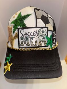 Soccer Mom themed Trucker Patch Hat. Message me your school colors.  These are the hottest trend on social media today. Great for festivals, concerts, night life and everyday wear. This foam trucker hat is fully adjustable and offered in hat colors Black, White, Light Pink, Neon Pink, Neon Yellow and Green Camouflage. Custom Hats avail. One size fits all. $35 Small Print: patch, mama, cowboy, hat, faith, rock and Roll, trucker, patch, cap, chain, iron on, sew on, festival, concert, neon, basebal Soccer Mom Hat, One Size Hip Hop Trucker Hat For Baseball Season, Trendy Snapback Trucker Hat For Baseball Season, Trendy Snapback Trucker Hat For Sports Events, Trendy Customizable Adjustable Baseball Cap, Trendy Customizable Baseball Cap, Themed Adjustable Baseball Cap, Fun Trucker Hat For Baseball Season, Themed Adjustable Snapback Baseball Cap