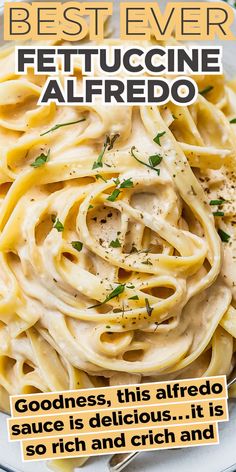 a white plate topped with pasta covered in sauce