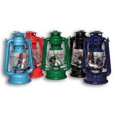 four different colored lanterns with one light on each side and the other in red, green, blue, and black