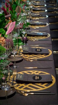 a long table is set up with place settings