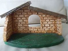 a small brick house made out of wood