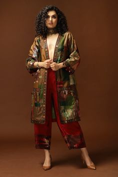 Gold, multicolor patchwork long jacket with tie and dye print and embroidered border.
Component: 1
Pattern: Print and Embroidery
Type Of Work: Tie and Dye, Sequin, Thread and Bead
Sleeve Type: Full
Fabric: Habutai Silk; Lining: Cotton Shantoon
Color: Gold,Multi Color
Other Details: 
Open front jacket
Note: Pant and choker worn by the model is not for sale
Note: This jacket can be worn by men and women
Occasion: Resort - Aza Fashions Long Jacket For Women, Long Jacket Women, Long Jackets For Women, Gold Jacket, Silk Kaftan, Women Jackets, Open Front Jacket, Silk Tunic, Indian Fashion Designers