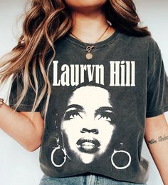 Lauryn Hill Shirt, The Miseducation of Lauryn Hill Unisex Heavy Cotton T-shirt, Lauryn Hill World Tour 2024 Shirt, Rapper Hip Hop TShirt : 100% Cotton (fiber content may vary for different colors) .: Medium fabric (5.3 oz/yd² (180 g/m .: Classic fit .: Runs true to size HOW TO ORDER Pick you favorite design. Review the size & color charts above FIRST and then select shirt size and color from the dropdown menu. Indicate the birthday year in the personalization box. Please note size measurements f Relaxed Fit Graphic Design Top For Fan Merchandise, Relaxed Fit Graphic Design Top For Fans, Relaxed Fit Top With Graphic Design For Fans, Crew Neck Top With Screen Print For Concerts, Fan Apparel Tops With Graphic Design And Relaxed Fit, Fan Apparel Top With Graphic Design And Relaxed Fit, Crew Neck Graphic Print Top For Concert, Relaxed Fit Fan Apparel Top With Graphic Design, Crew Neck Graphic Print Top