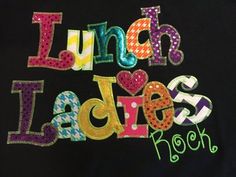 a black shirt with the words lunch ladies rock written in multicolored sequins