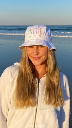 This adorable surfboard bucket hat is seriously the best thing I ever bought. I will be wearing it all summer long. I love this beach bucket hat.