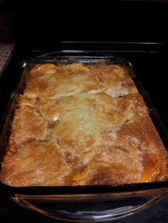 a casserole dish sitting on top of an oven