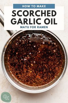 how to make scorched garlic oil in a saucepan with text overlay