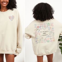 Get ready to explore the world in style with this chic, travel-themed crewneck sweatshirt! Featuring a unique design filled with colorful passport stamps from destinations around the globe, this sweatshirt captures the essence of wanderlust. The playful twist on the classic phrase "All you need is love" with the word "love" crossed out and replaced by "a passport" reflects the adventurous spirit of travel lovers. Please use the sizing guide for additional guidance on sizing! This Sweatshirt is a Unisex-style, so it has a smaller fit than men's sizing, but a little larger fit than women's sizing. Please size up 1-2 sizes for the Oversized Look. This design is an original, created by Sarah Scheiner @ She's Speaking Designs. She uses digital graphic design elements along with various fonts an Travel Sweater, Passport Stamps, Crewneck Vintage, Digital Graphic Design, Graphic Design Elements, Travel Lover, Flight Attendant, All You Need Is Love, Travel Gifts