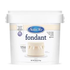 a bucket of fondant sitting on top of a white table