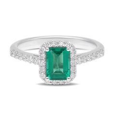 Diamond and Emerald Cut Emerald Ring An all-time favorite and classic, the Nouveau ring features the popular halo design with a stunning emerald-cut emerald surrounded by sparkling diamonds. SKU BS10362R EMERALD SIZE 7X5mm COLORSTONE SHAPE Emerald Cut COLORSTONE WT 0.87cts DIAMOND WT 0.39cts Ethically sourced emeralds directly from our renowned Belmont mine in Brazil. Emerald Cut Emerald Ring, Halo Design, Emerald Jewelry, Emerald Ring, Sparkle Diamonds, Emerald Cut, Gold Material, Earring Necklace, Ring Necklace