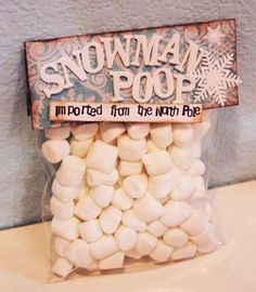 a bag filled with marshmallows sitting on top of a counter