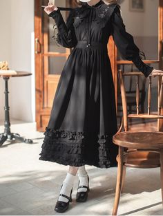 The price is for a dress only, the black waist belt is not included. Garment Size SizeSMLXLShoulders35363738Bust84889296Sleeve Length64656667Waist68727680Full Length118120122124 Black Long Sleeve Victorian Dress For Fall, Black Belted Dresses For Fall, Black Victorian Dress With Long Sleeves For Fall, Black Long Sleeve Dress With Belt, Black Vintage Dress With Ruffles For Fall, Black Vintage Dress For Spring, Black Long Sleeve Gothic Midi Dress, Vintage Black Long Sleeve Dress, Black Belted Maxi Dress