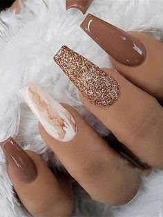 The process involves swirling different shades of nail polish on the nail surface, creating a marbled effect that looks like the natural veins and patterns found in marble stone. Brown Acrylic Nails, Brown Nails Design, Summer Acrylic, Different Nail Designs, Winter Nails Acrylic, Nail Colors Winter, Fall Acrylic Nails