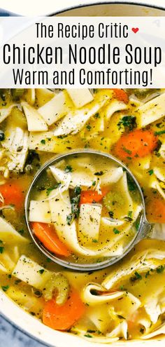 a bowl of chicken noodle soup with carrots and broccoli in it