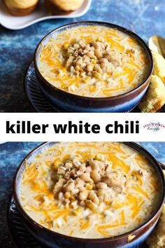 two bowls filled with white chili and cheese on top of a blue counter next to some bread