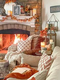 a living room filled with furniture and a fire place