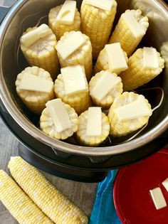 corn on the cob and butter in a crock pot