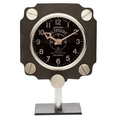 a black and silver clock sitting on top of a metal stand