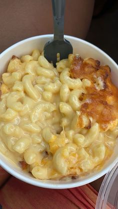 a white bowl filled with macaroni and cheese