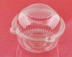 a clear plastic container with a lid on a pink tableclothed background and the words usa seller above it