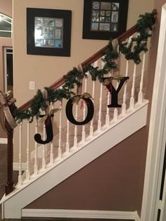 the stairs are decorated with christmas decorations