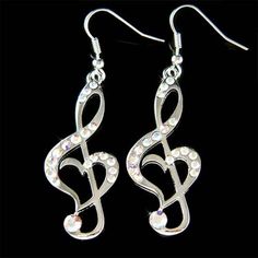 "PERFECT GIFT FOR MUSIC FANS, INSTRUCTOR, TEACHER OR STUDENT!! Great Gift for Bride who are musician. You are getting 1 pair of Swarovski Clear crystals Treble Clef Music Note Heart earrings, attached to silver rhodium finish french wires. Crystal Color: Light Amethyst The earrings measure 11/16\" wide X 2 1/4\" high (18mm X 57mm) high including the ear wire. Prices are in US$. For shipping policies and other important information, click on \"profile\" on the right. See an item that you like but Heart Christmas, Music Jewelry, Gold Jewelry Necklace, Musical Note, Love Music, Music Note, Gold Filled Earrings, Crystal Ab, French Wire