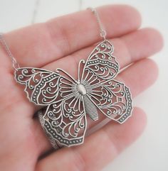 "Vintage Necklace - Silver Necklace - Butterfly Necklace - Filigree Necklace - Butterfly Jewelry - Statement Necklace - handmade jewelry This is such a fabulous necklace! A gorgeous silver plated filigree butterfly hangs from a pretty silver plated chain. So very feminine. Chloe says, \"Wear it and feel fabulous!\" The butterfly measures 2\" wide and 1 1/2\" long. You can choose the length you would like at checkout. Thanks for visiting Chloe's" Butterfly-shaped Filigree Jewelry Gift, Butterfly Shaped Filigree Jewelry Gift, Butterfly Filigree Jewelry As A Gift, Handmade Silver Butterfly Necklace, Butterfly Filigree Jewelry Gift, Unique Handmade Silver Butterfly Necklace, Unique Filigree Jewelry For Gifts, Unique Nickel Free Necklace For Wedding, Handmade Adjustable Butterfly Necklace