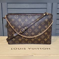 Louis Vuitton Enghien Double Compartment Shoulder Crossbody Bag. Brown Monogram Coated Canvas With Gold Brass Hardware. One Exterior Zippered Pocket. Top Double Zippered Closure. Original Brown Monogram Adjustable Strap With Gold Brass Clips With Lv Logo Engraved. The Interior Of The Two Compartments Is All Leather With Two Zippered Pockets And Two Slip Pockets. Excellent Condition! All Zippers Work Perfectly. Comes With Dust Bag And Unbrandedaccessory Chain. Date Code: 884 [April 1988] Approx S Lv Logo, Pocket Top, Gold Brass, Brass Hardware, Authentic Louis Vuitton, Brown Gold, Louis Vuitton Bag, Louis Vuitton Monogram, Crossbody Bag