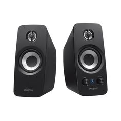 two black speakers sitting next to each other