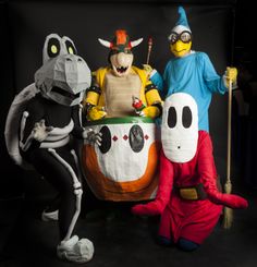 three people dressed up in halloween costumes