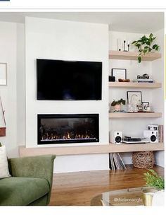 a living room filled with furniture and a flat screen tv mounted on the wall above a fire place