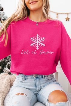 Cozy up this season with the ultimate festive favorite: the "Let It Snow" winter sweatshirt! Perfect for sipping cocoa, strolling through twinkling lights, or hitting the slopes, this vintage sweatshirt is a must-have!  #HolidayFashion #WinterWardrobe #CozyChristmas #ChicHoliday #CuteSweatshirt #holidaysweatshirt #retrochristmas #holidaycollection  #cozyvibes #holidaystyle #festivefashion #holidayseason #christmasgifts #CuteSweatshirt  #ChristmasVibes #festiveholiday #apresski #skiwear Holiday Hoodies, Winter T Shirts, Chic Holiday, Twinkling Lights, Holiday Sweatshirt, Winter Sweatshirt, Cute Sweatshirts, Snow Winter, Let It Snow