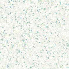 a white background with blue and green speckles