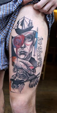 a man's leg with a tattoo on it that has an image of a pirate