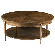 an oval coffee table with two tiered shelves on the bottom and one shelf below it