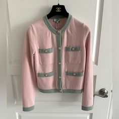 Sold Out Everywhere! Stunning Pink And Green Combination With Crystal Cc Logo Buttons. Size 34. Fits Xs/S Serious Inquiries Only!! Chanel Cardigan, Green Combination, Chanel Cruise, Cruise Collection, Cc Logo, Pink And Green, Sweaters & Cardigans, Sweaters For Women, Chanel