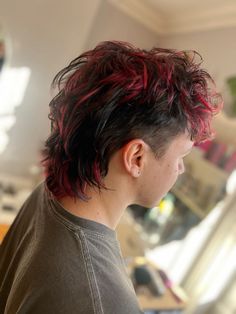 Black mullet with red highlights. Half Red Half Black Hair Men, Colored Short Hair Men, Mullet Hairstyle Color, Masculine Hair Color Ideas, Mullet Dyed Tips, Mens Alt Mullet, Queer Hair Color Ideas, Asian Mohawk, Black With Red Highlights Short