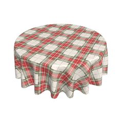 a round table with a red and white checkered cloth on it, sitting in front of a white background