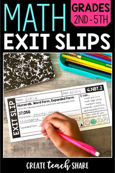 a close up of a person holding a pencil near a paper with the words math exit slips on it