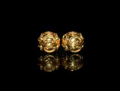 These are two large hole 22 karat gold vermeil beads featuring granulation work handmade in our Bali workshop. Diameter is 12mm. Hole size is 5mm. Weight is 5.88 grams. Check out our other Gold Vermeil beads: https://www.etsy.com/shop/KartiniStudio?section_id=16821428&ref=shopsection_leftnav_5 Ceremonial Yellow Gold Jewelry With Round Beads, Large Gold Beads For Gift, Large Gold Beads For Gifts, Gold Large Beads For Gifts, Formal Gold Faceted Beads, Artisan Large Gold Beads, Spiritual Large Gold Beads, Large Gold Spiritual Beads, Hand-strung Gold Rondelle Beads