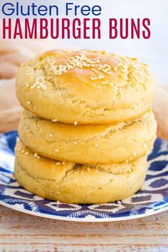 gluten free hamburger buns on a blue and white plate with text overlay