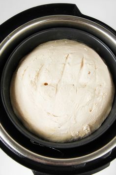 a close up of a dough in a crock pot